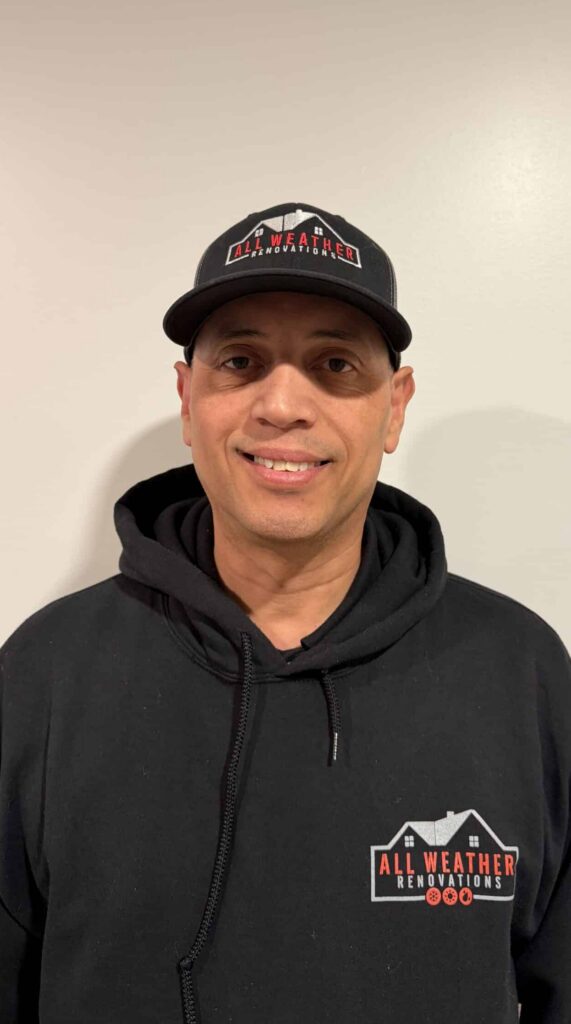 All Weather Renovations team member in Atlanta, Georgia, showcasing professional expertise in residential remodeling, including kitchens, basements, decks, and siding projects.